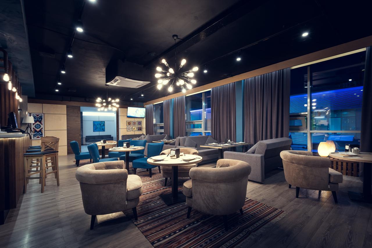 AYKUN Hotel Astana Buitenkant foto