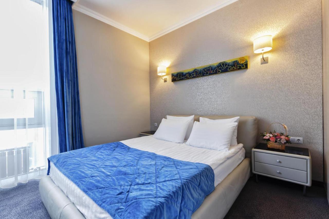 AYKUN Hotel Astana Buitenkant foto